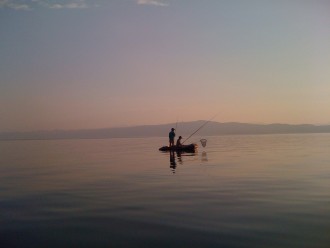 pescatori al tramonto